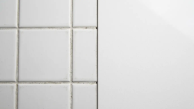 quartz surface vs ceramic tile comparison commercial construction contractor 2026